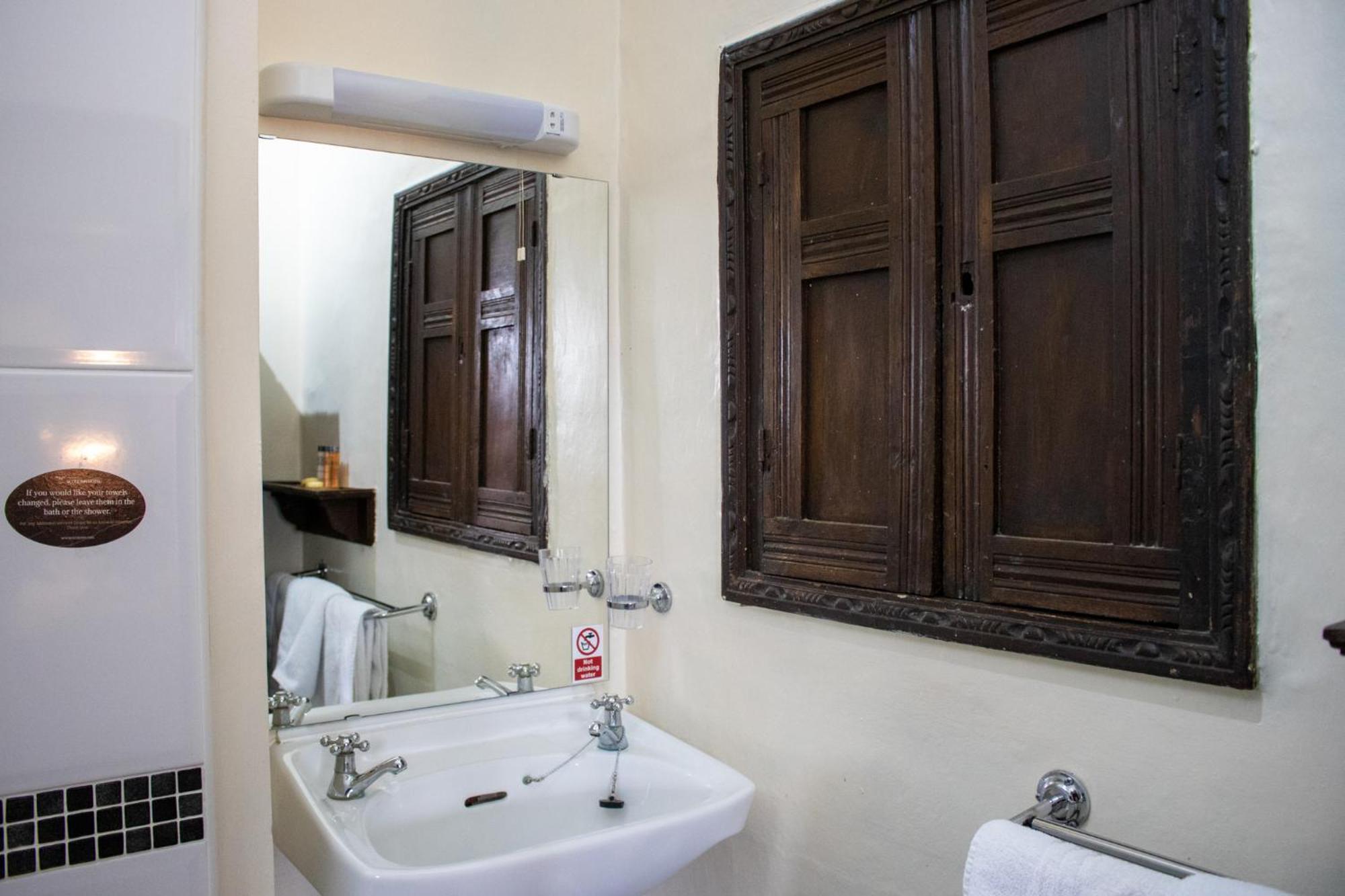 Scole Inn Hotel Дис Стая снимка